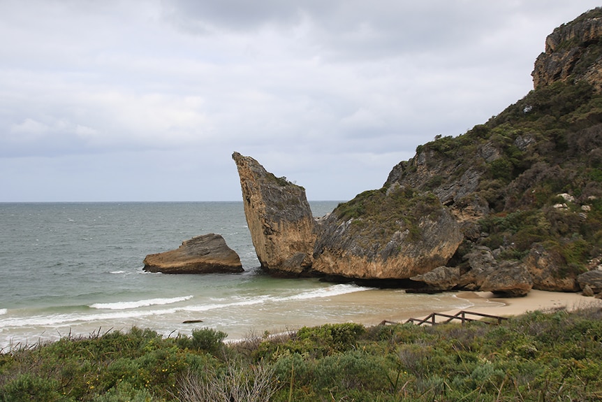 Large rock protruding off a headline