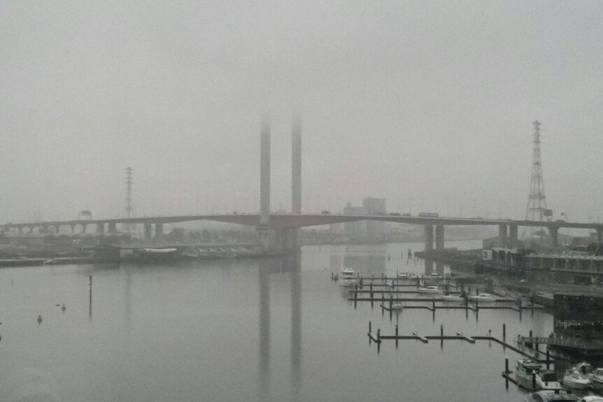 Low cloud surrounds the Bolte Bridge in Melbourne