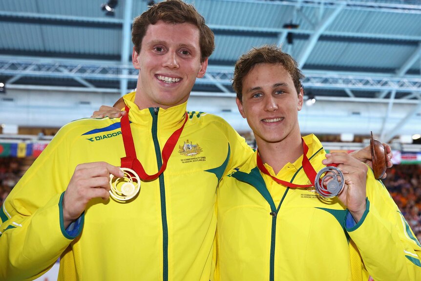 Australia's Thomas Fraser-Holmes (L) and Cameron McEvoy take gold and silver in 200m freestyle.