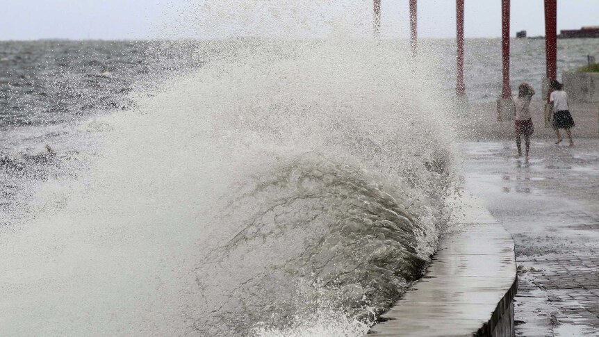 Big waves crash at the coast due to strong winds brought by Typhoon Goni