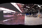 A virtually empty warehouse.