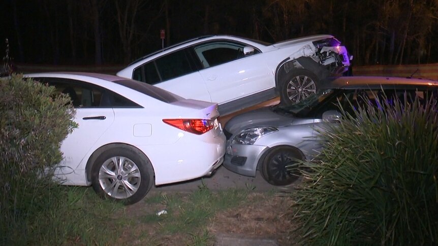 a car on top of another car after a collision