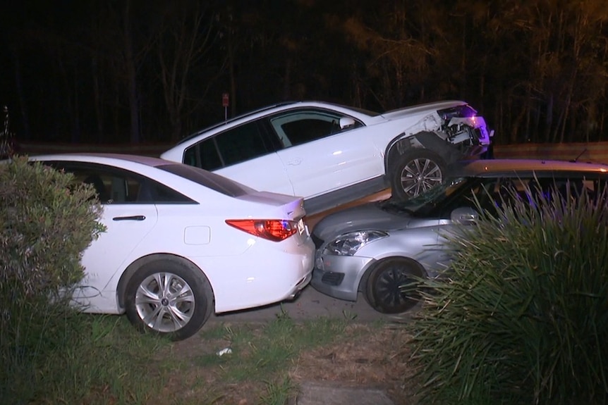 a car on top of another car after a collision