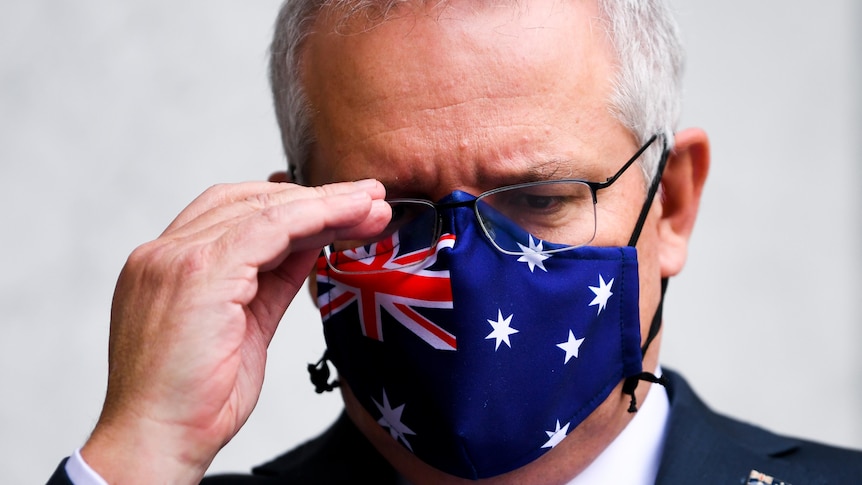 The PM with a face mask