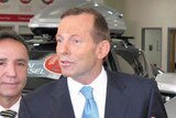 Federal Opposition leader Tony Abbott talks to media in Launceston, Tasmania.