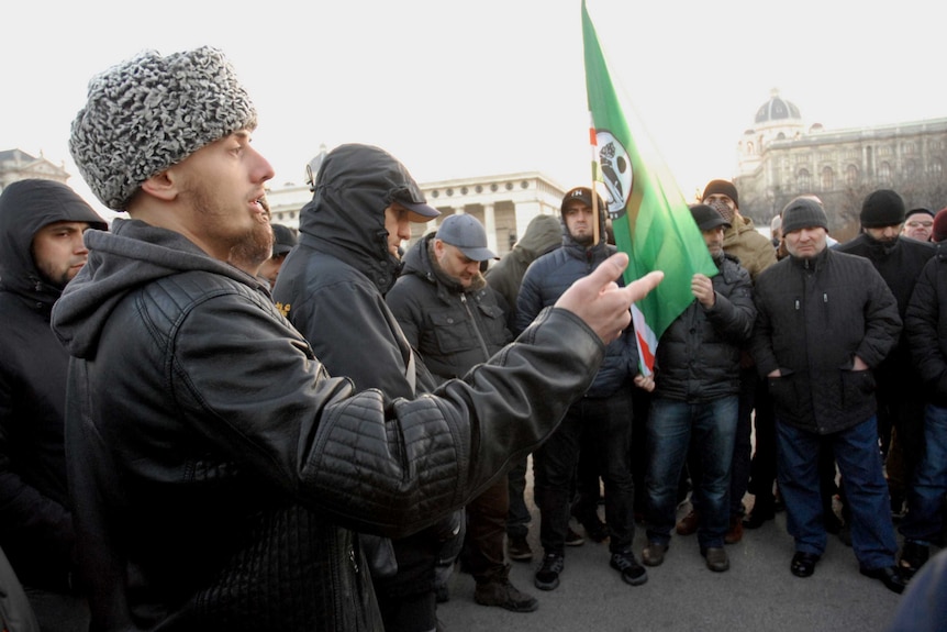 Chechen Mansur Sadulaev speaks at the rally in Vienna