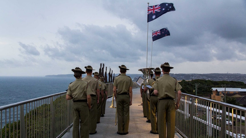 People gather on Newcastle's Memorial Walk for an Anzac sunset ceremony on April 22nd 2016.