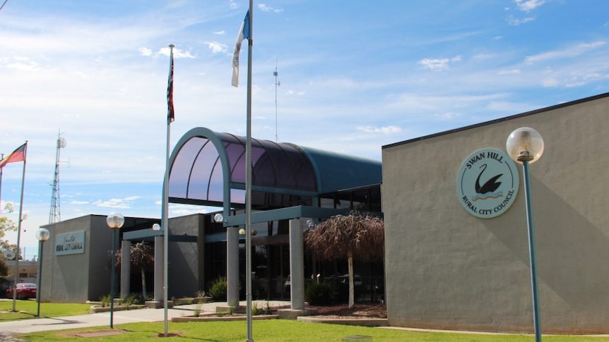 An image of a blue and grey council building.