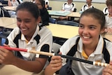 Two year7 girls learning Gathang language at Taree High School.