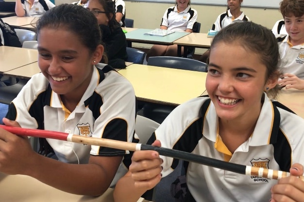 Two year7 girls learning Gathang language at Taree High School.