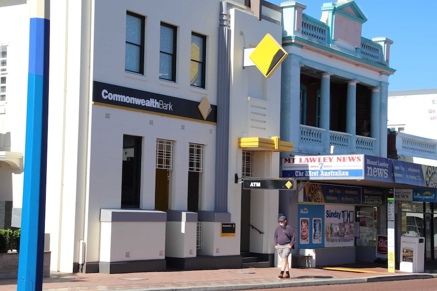 A Commonwealth Bank branch in Mt Lawley with a pedestrian walking past.
