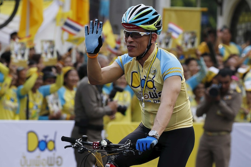 Thai King Maha Vajiralongkorn leads a cycling event in Bangkok in 2015.