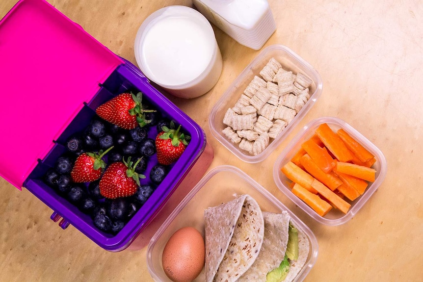 A table of food from above in containers