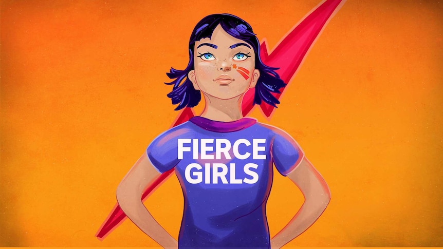 A young woman stands proudly before a lightening bolt wearing a T shirt emblazoned with the words fierce girls