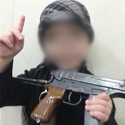 Child of terrorist Khaled Sharrouf with gun