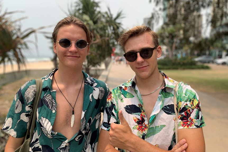 Fabian Johansson and Kristoffer Gregenas stand together on a street on the Gold Coast.