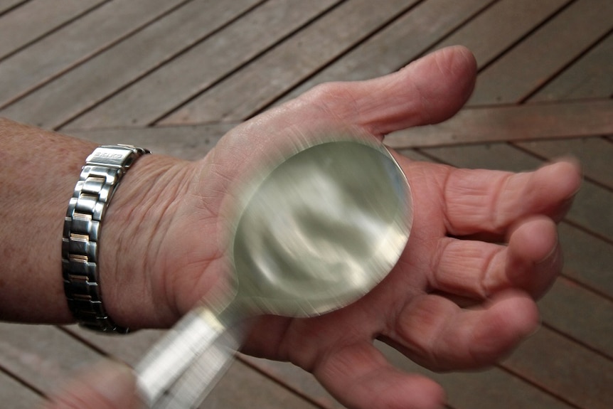 Spoons being played close-up.