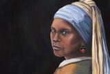 An Aboriginal woman is dressed in a brown gown with blue head coverings in a new take on Vermeer's Girl with a Pearl Earring.