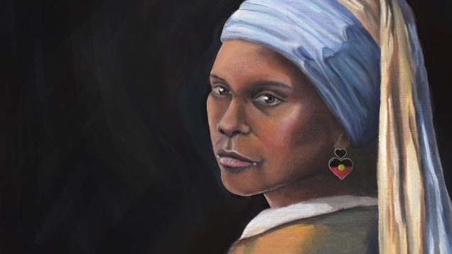 An Aboriginal woman is dressed in a brown gown with blue head coverings in a new take on Vermeer's Girl with a Pearl Earring.