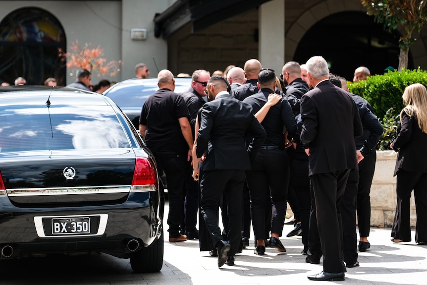 Mourners at Vanessa Tadros funeral