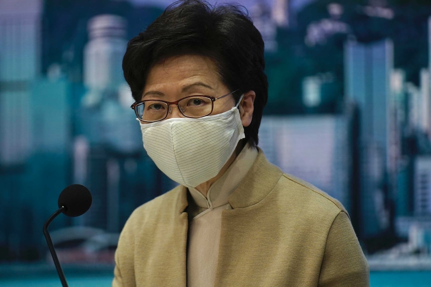 Hong Kong Chief Executive Carrie Lam listens to questions during a news conference.