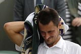 Bernard Tomic crashes out