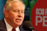Former WA Premier Colin Barnett answers questions durign an interview in an ABC radio studio