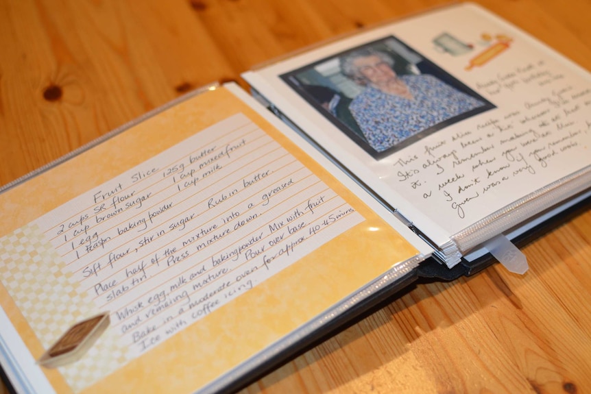 Recipe book with handwritten recipe for fruit slice