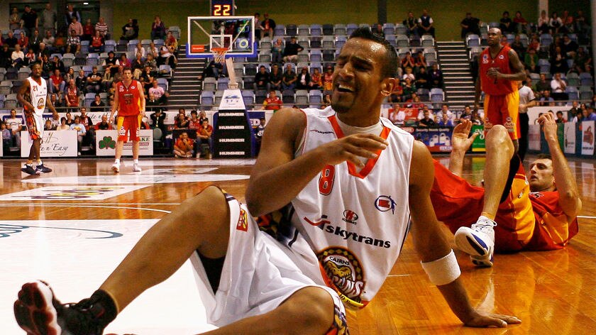 Aaron Grabau hits the boardsThe Taipans have been floored after a major sponsorship deal fell through.