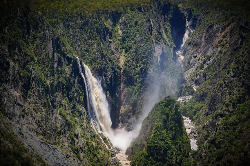 Two waterfalls feed into the river below.