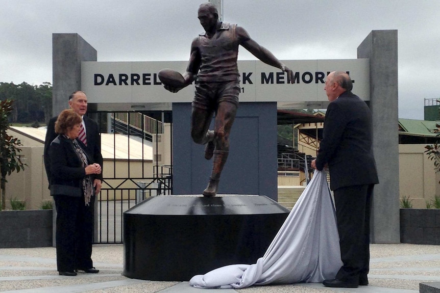 A statue of VFL/AFL great, Darrel Baldock, is unveiled in the Tasmanian town of Latrobe.