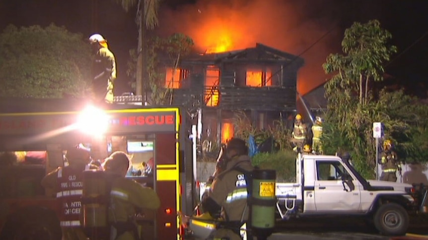 Fire engulfs a two-storey Queenslander in Rokeby Terrace at Taringa on Brisbane's westside