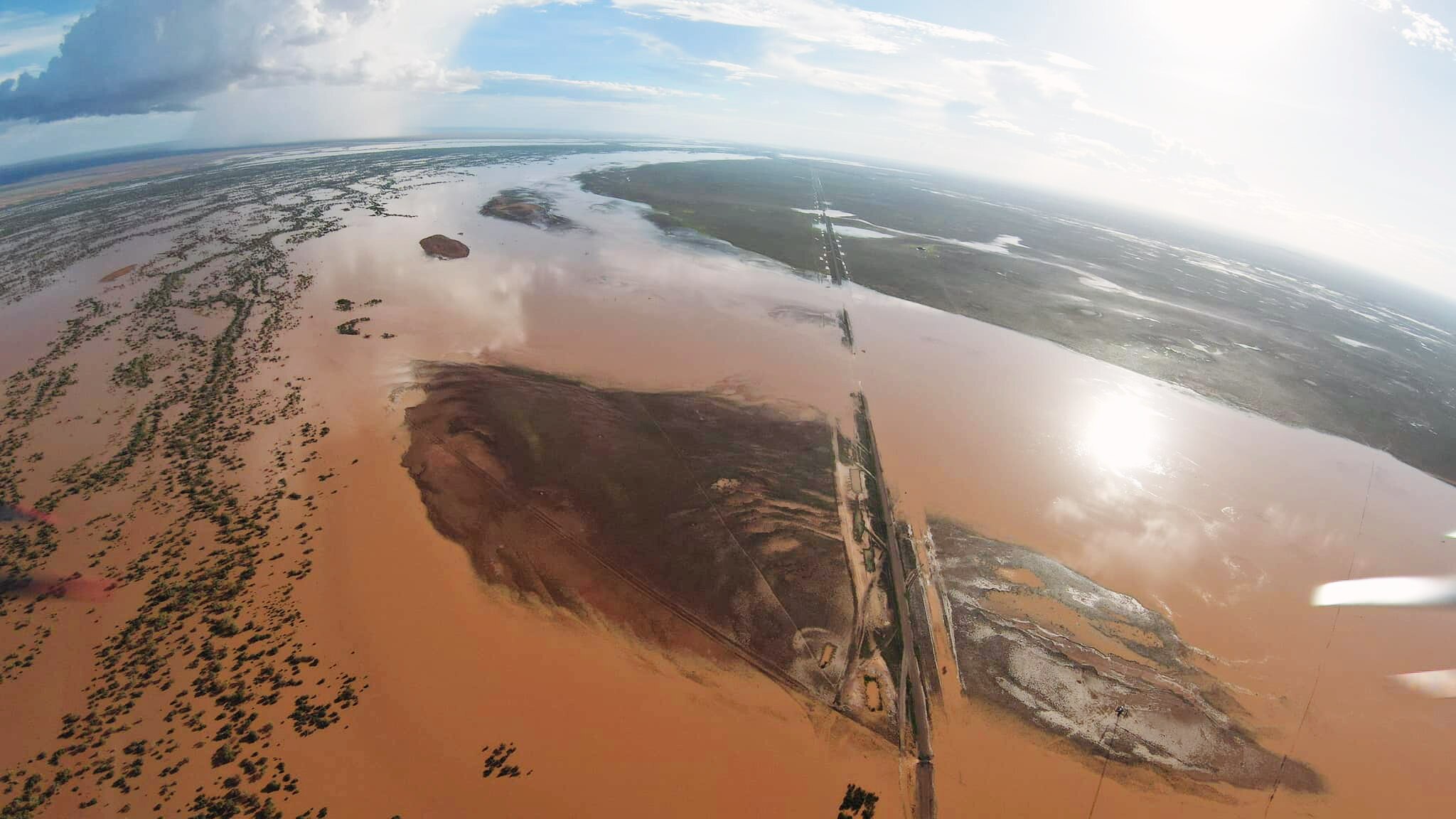 an aerial of a flooded road