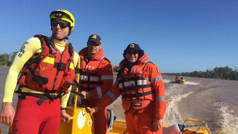 SES volunteer and QFES swift water rescue personnel on the Fitzroy River