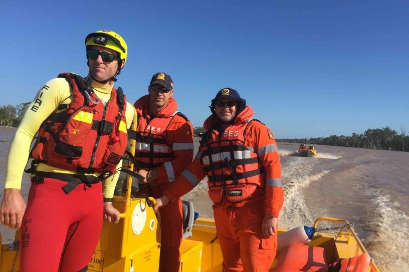 SES volunteer and QFES swift water rescue personnel on the Fitzroy River