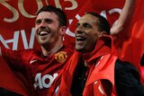 Twentieth title ... Michael Carrick and Rio Ferdinand celebrate another United title