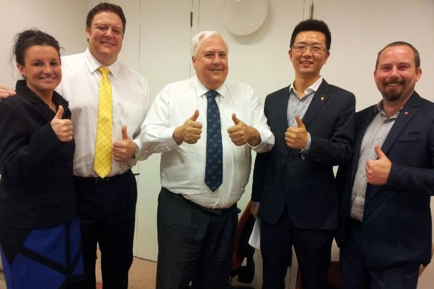 Jacqui Lambie with Clive Palmer and PUP members, 2013.