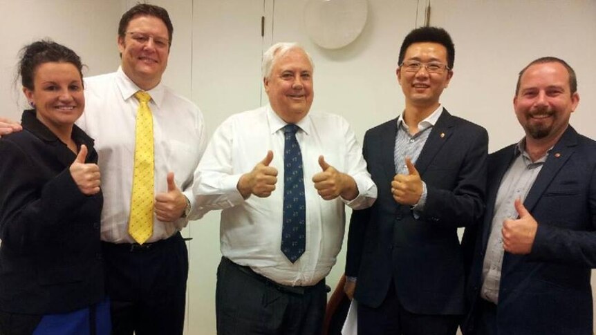 Jacqui Lambie with Clive Palmer and PUP members, 2013.