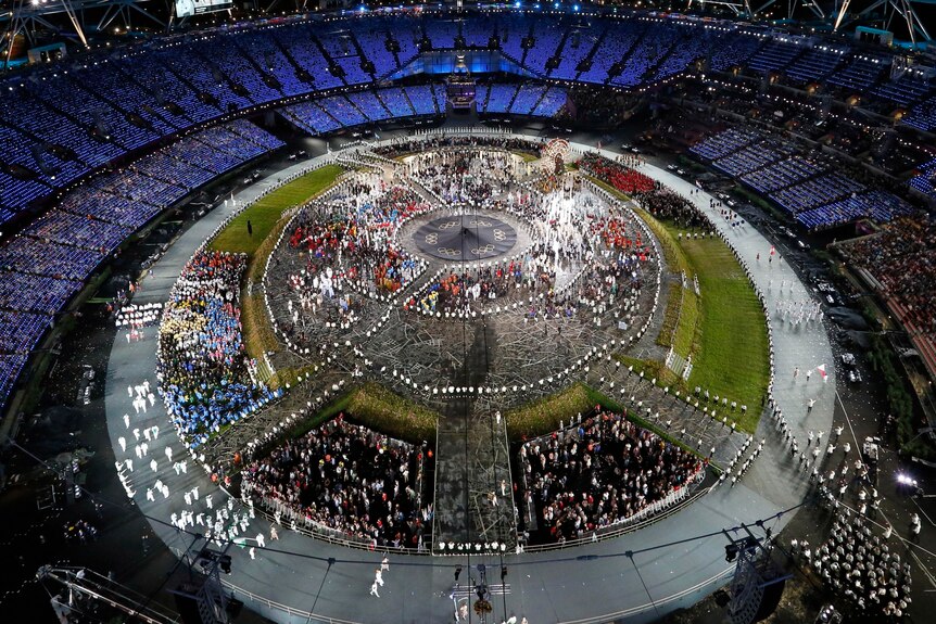 Athletes parade around the Olympic Stadium during the opening ceremony of the London Olympic Games.