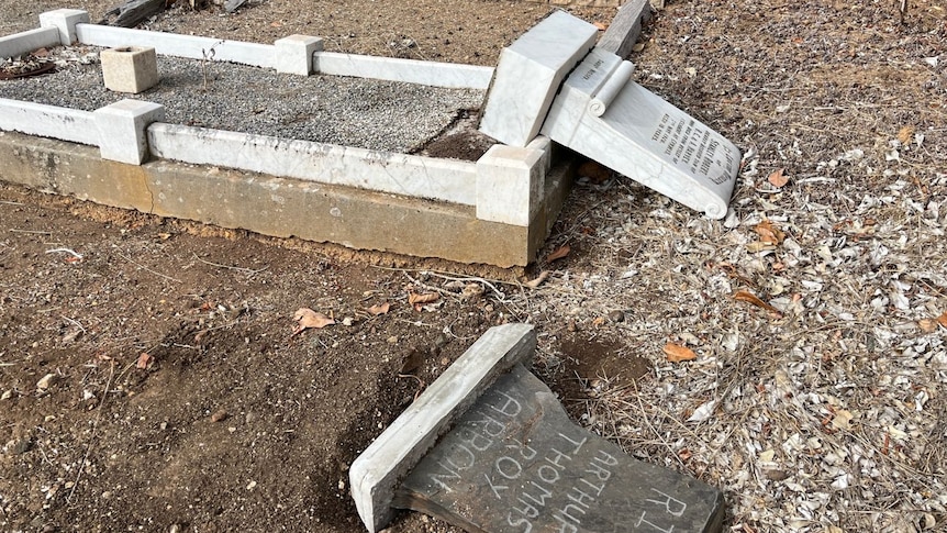 two old graves knocked over