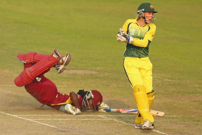 Stafanie Taylor fails to make her ground as Alyssa Healy takes the bails