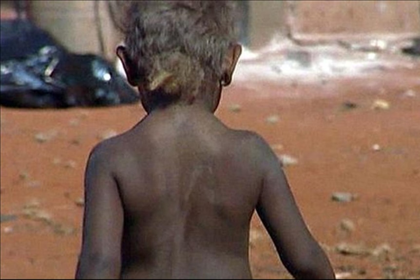 The back view of an Indigenous child.