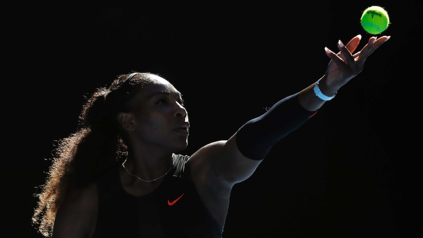 Serena Williams prepares to serve to Mirjana Lucic-Baroni during their semi-final