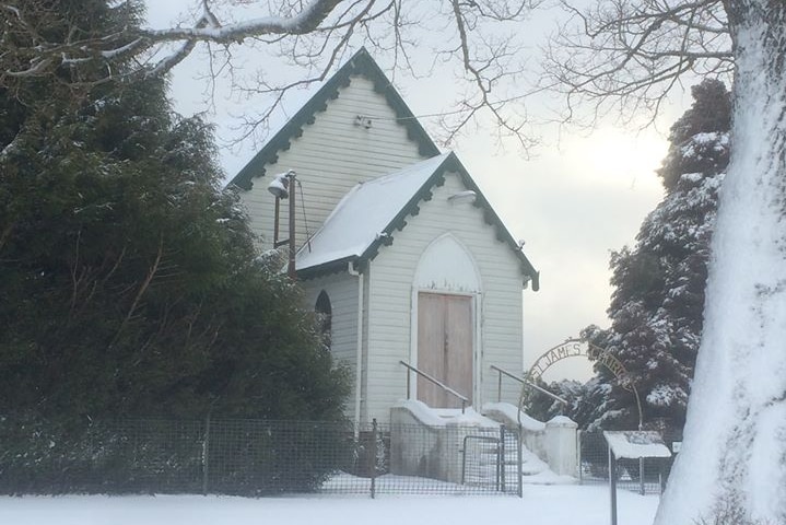 St James Anglican Church in Waratah blanketed in snow