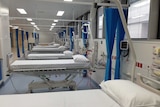 Beds in a hospital ward.