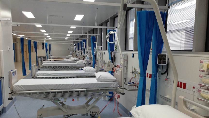Beds in a hospital ward.