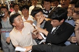 Relatives of South Korean Sewol ferry victims protest at trial