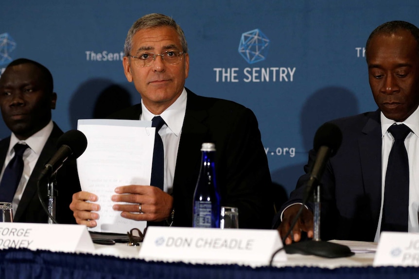 George Clooney at release of Sentry report