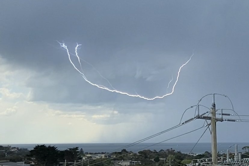 Picture of lightning across grey sky.