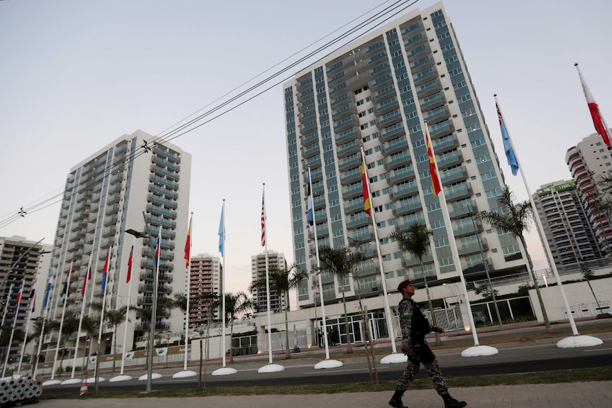 A policeman patrols the Rio 2016 Olympic Village